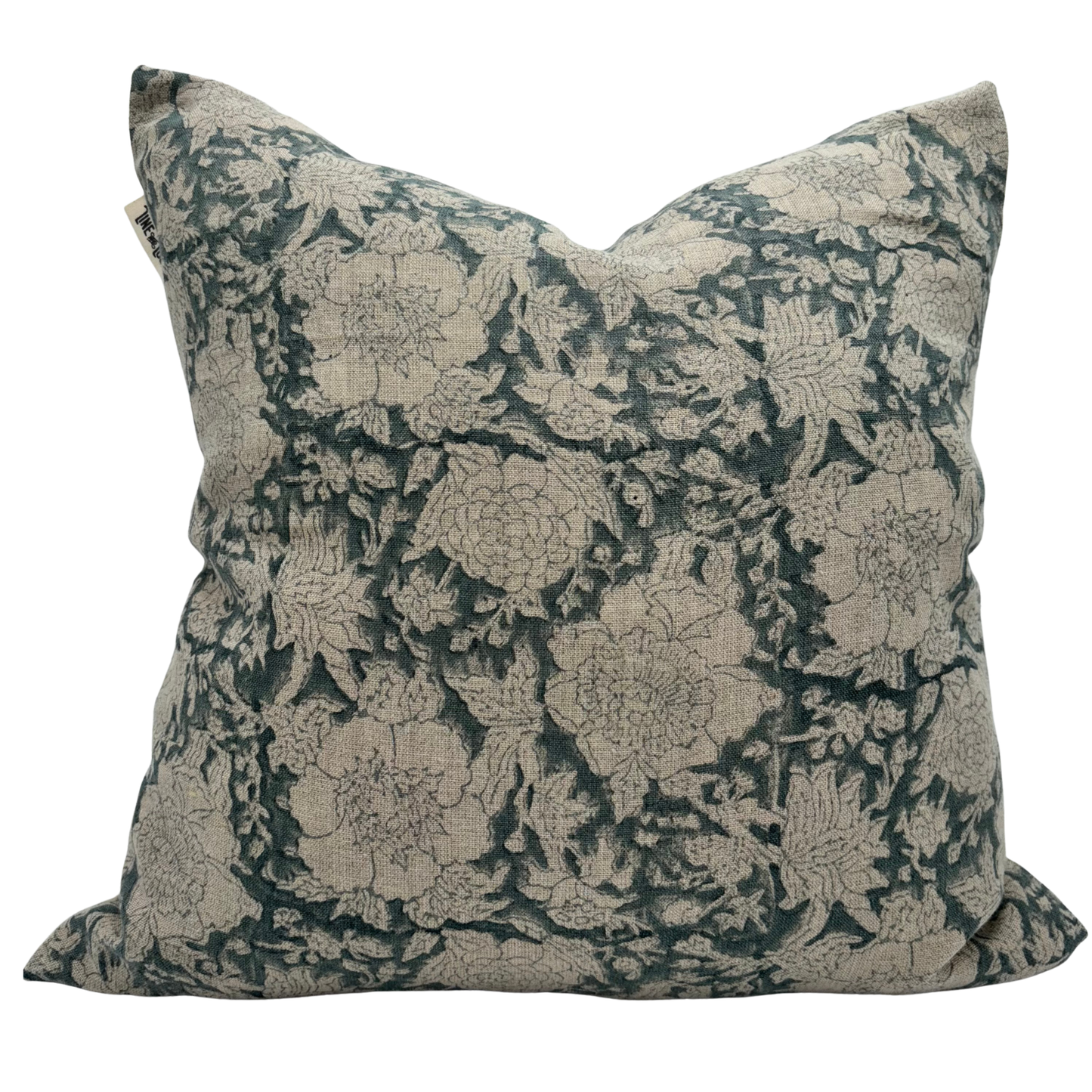 Decorative pillow with floral pattern on a white background