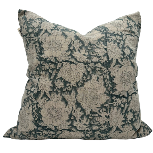 Decorative pillow with floral pattern on a white background